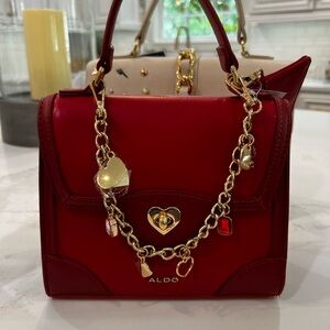 Aldo Red and Gold Satchel with Elegant Chain Detail